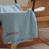 Hand-embroidered baby blanket in blue