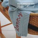 Hand-embroidered baby blanket in blue